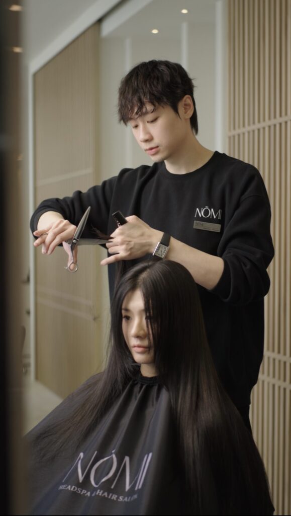 Haircut consultation at NŌMI Bukit Jalil